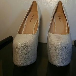 High heeled shoes
